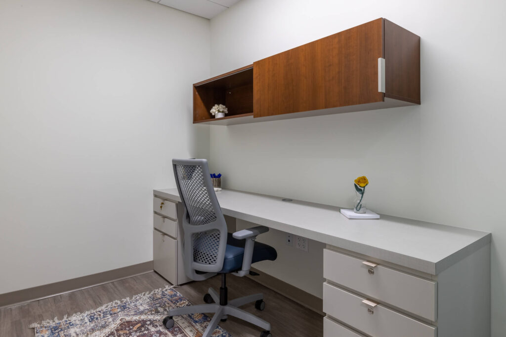 MetroOffices Fairfax 36 - Metro Offices Office space for rent with desk and chair.