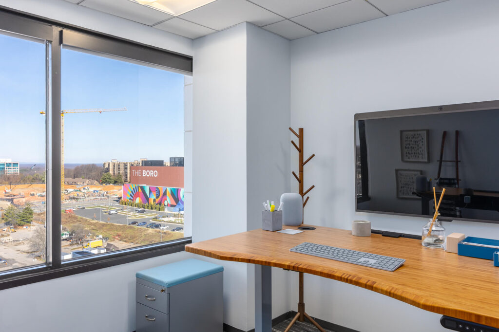 MetroOffices Tysons 28 - Metro Offices An office space for rent furnished with a desk and window.