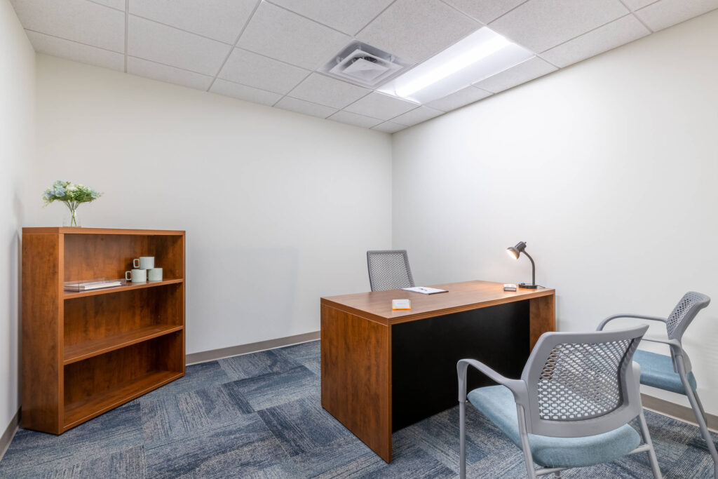 MetroOffices Fairfax 37 - Metro Offices Office space for rent equipped with a desk and chair.