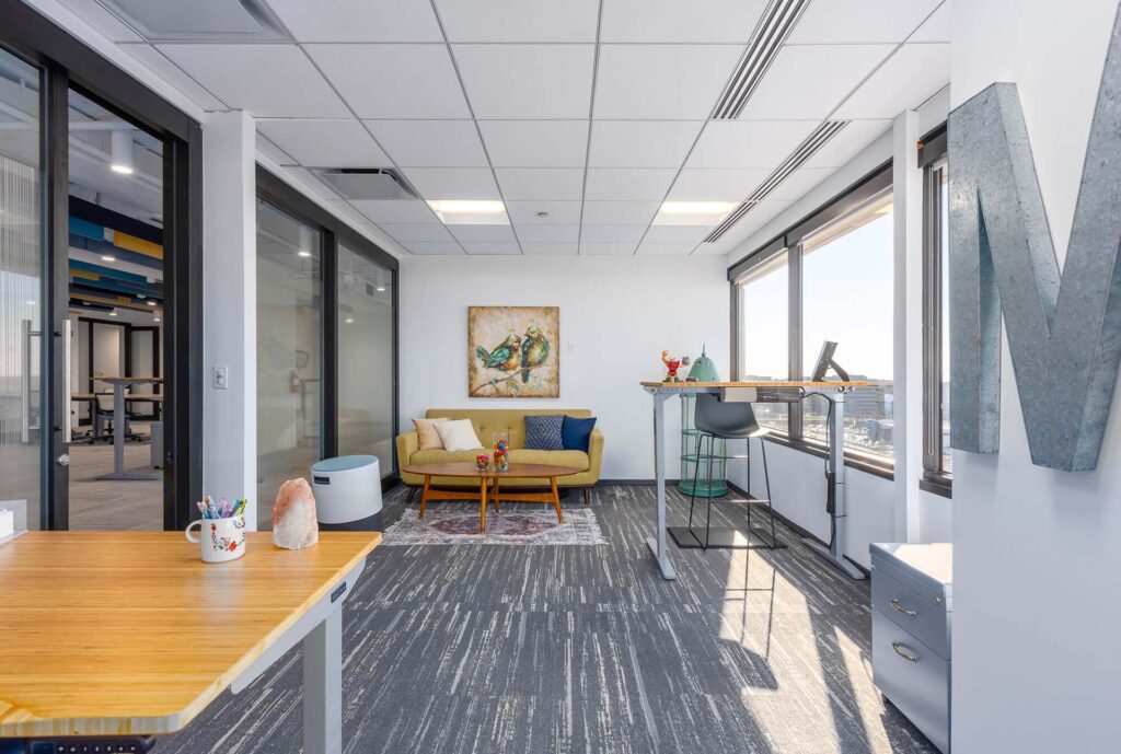 MetroOffices Tysons 33 - Metro Offices Office Space with Desk, Chairs, and Large Window available for rent.