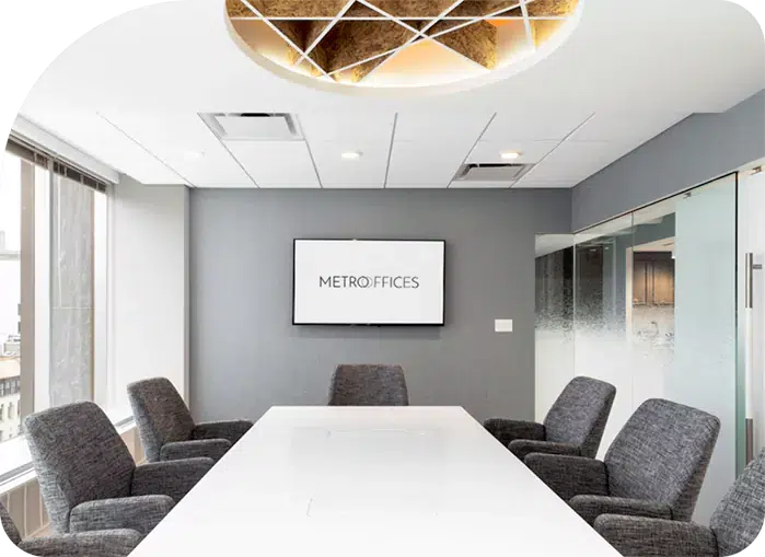 High Tech 2024 - Metro Offices A meeting room with a white table and chairs.