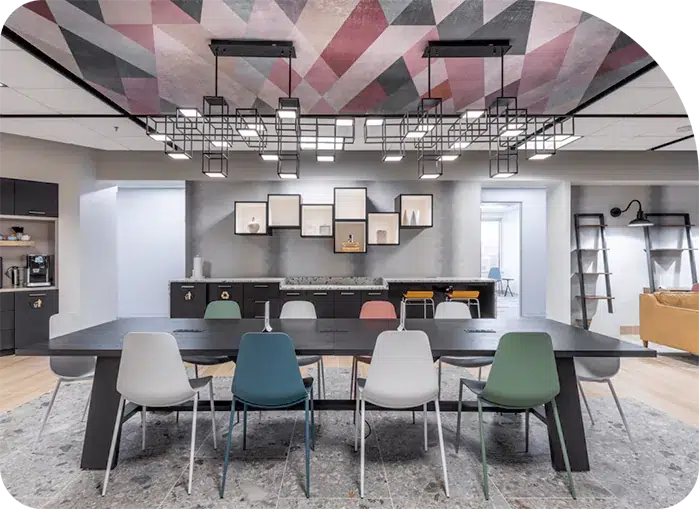 Imag 2 Comfortable seating 2024 - Metro Offices A meeting room with colorful ceiling.