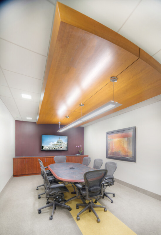 A Woodland-themed conference room with a wooden ceiling.